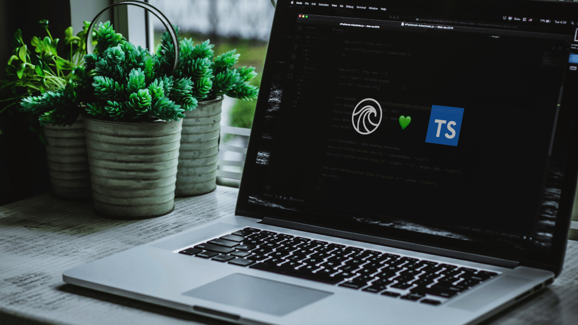 Scriptide and TypeScript logos on a computer monitor.